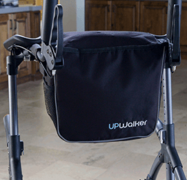 Luxury UPWalker-branded personal item bag connected to the front of an upright walker, on the opposite side of the seat.